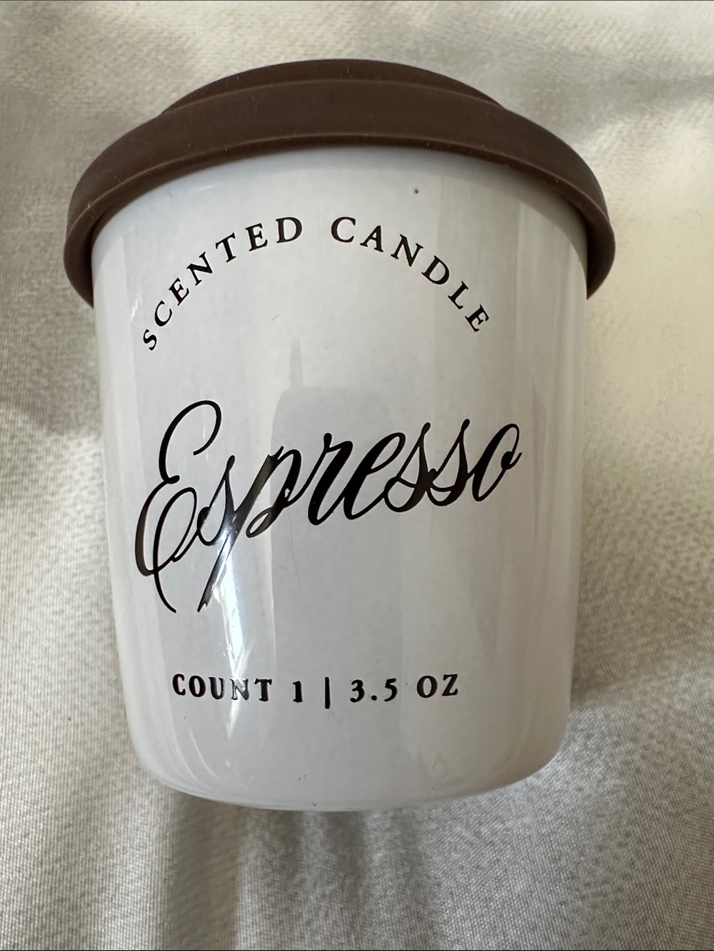Espresso scented candle with realistic vented lid. 3.5 oz.